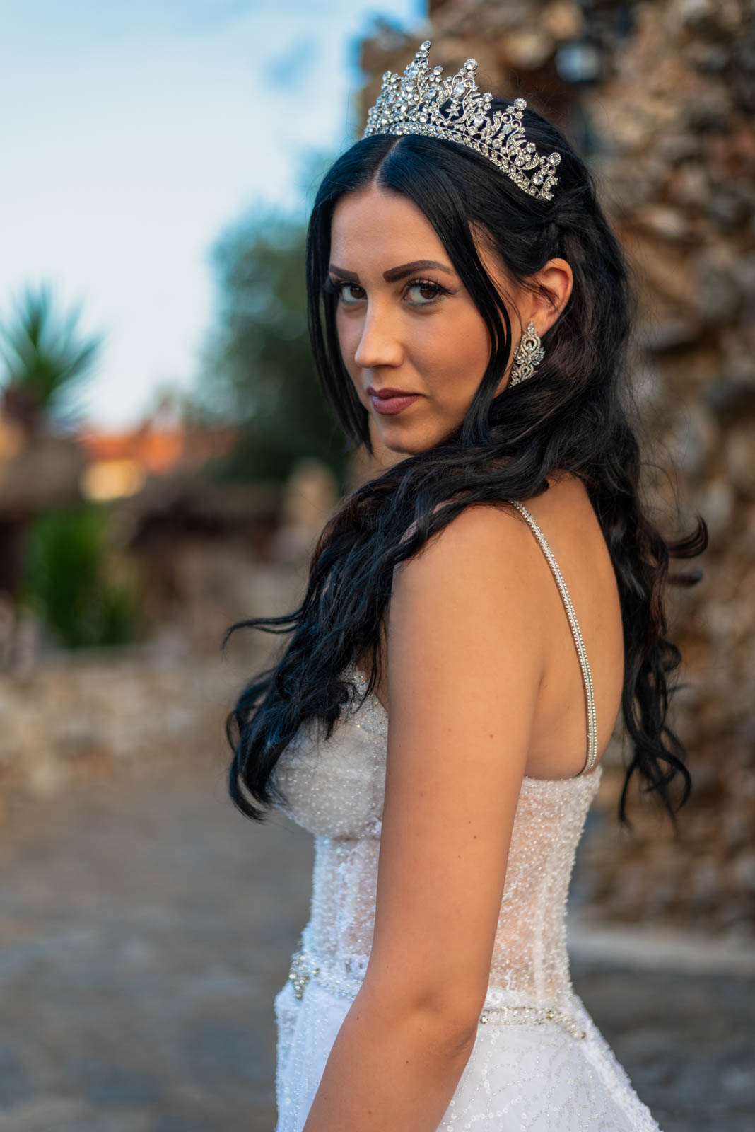 Portrait of a bride in her wedding dress and tiara.